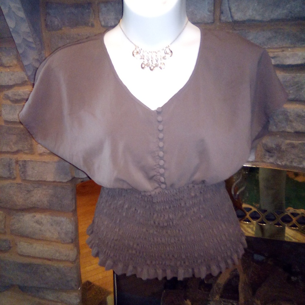 Beautiful taupe top!!!!  Will Slim you